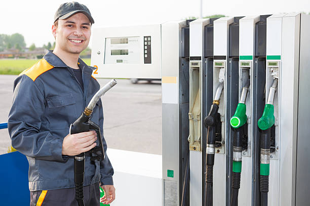 stazione di rifornimento - gas fuel pump labeling fuel and power generation foto e immagini stock