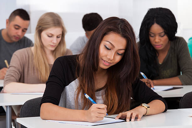 istock Female College Student Sitting In Classroom 510104393