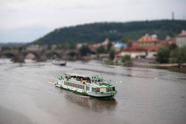 Boat in Vltava river with tilt shift lens effect.