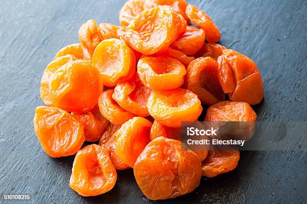 Dried Apricots On Black Background Stock Photo - Download Image Now - Appetizer, Apricot, Close-up
