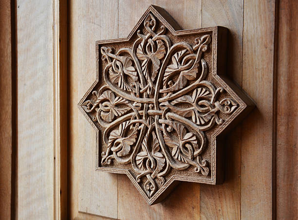 istock Ornament on wooden door 510128555