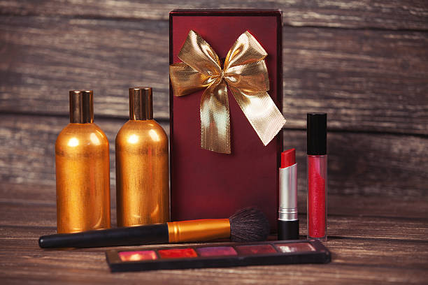 istock Perfume and gift box on wooden table. 510128701