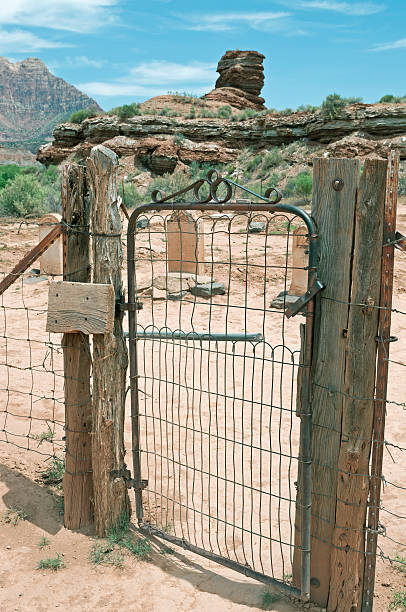 istock Gate leading to pioneer cemetery at Grafton UT 510131369