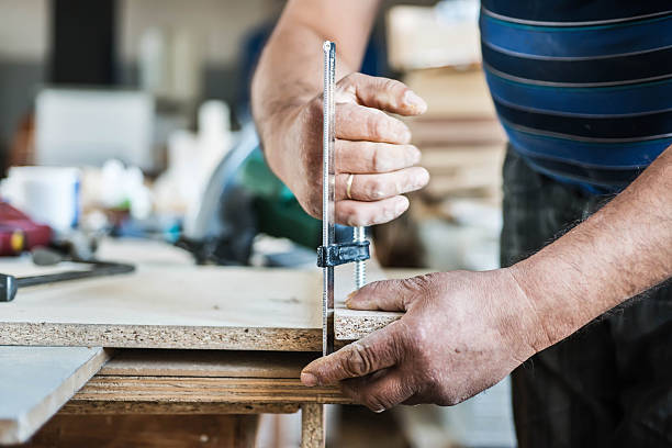 istock Close up of carpenter hands 510131491