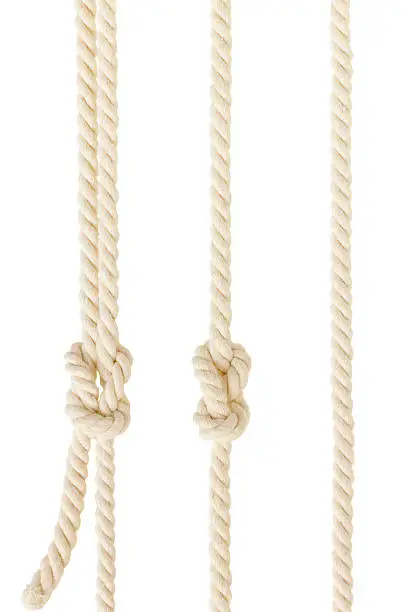 Photo of ship ropes with knot isolated