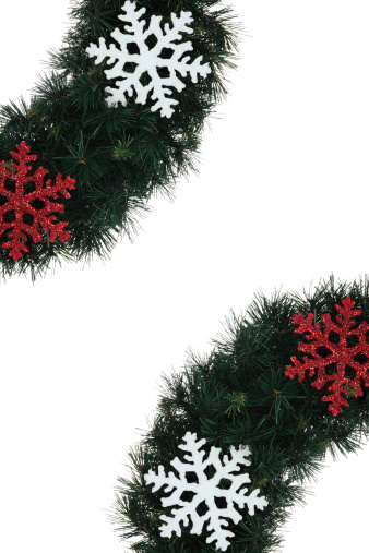 Decorative Christmas garland with bells on a white background. Copy space