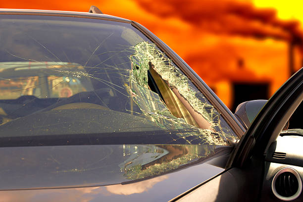 istock Broken windscreen at black car in traffic accident 510148624