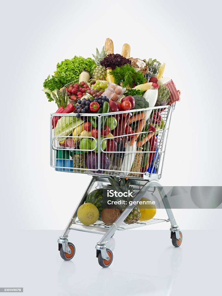 shopping cart with food shopping cart full of luxury food Shopping Cart Stock Photo