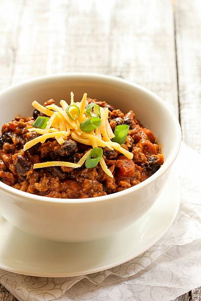 istock Beef chili with kidney beans and cheese topping 510149594