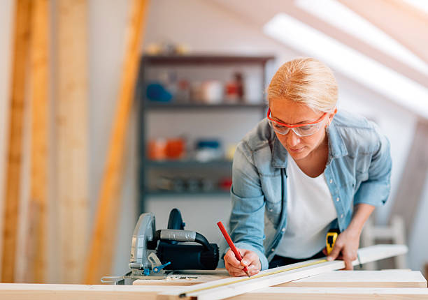 istock Mature female carpenter working in her workshop 510149600