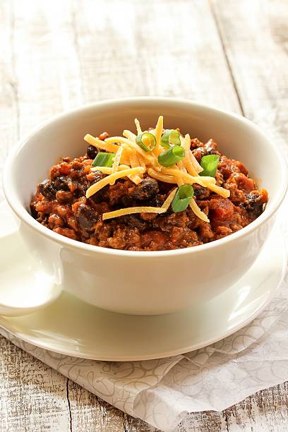 istock Beef chili with kidney beans and cheese topping 510149622