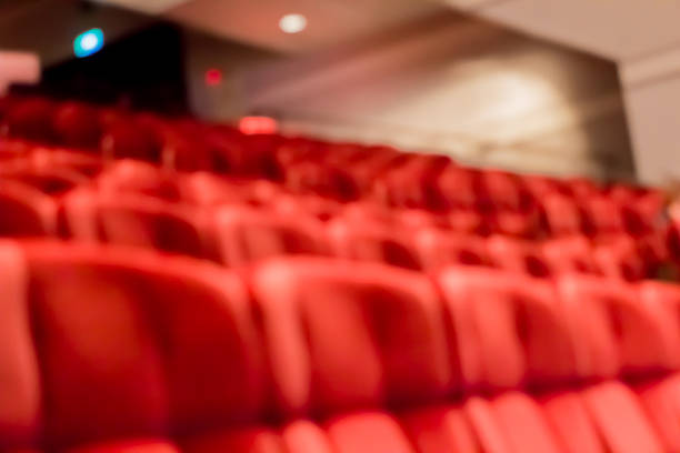 istock blur row of  empty red auditorium or theater seat 510150458