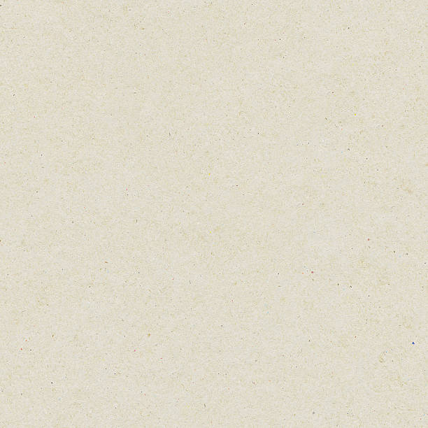 Seamless washy sandy grainy plain light beige paper texture background