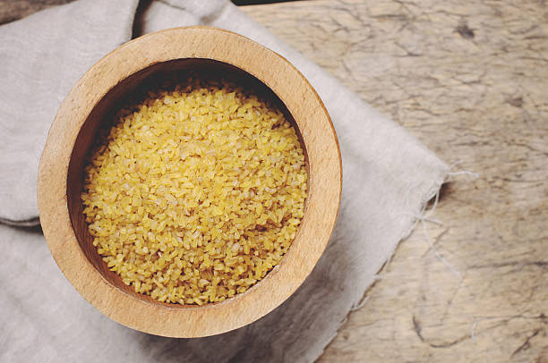 istock Raw Bulgur on wooden background 510153850