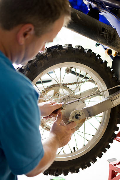 istock Mechanic Repairing Motorcyele 510153929
