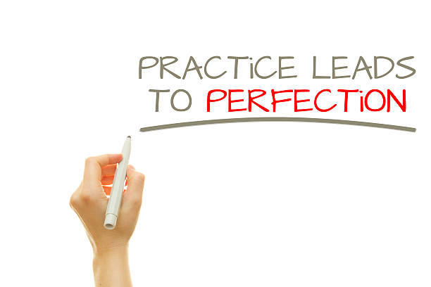 istock Hand writing Practice leads to perfection 510155824