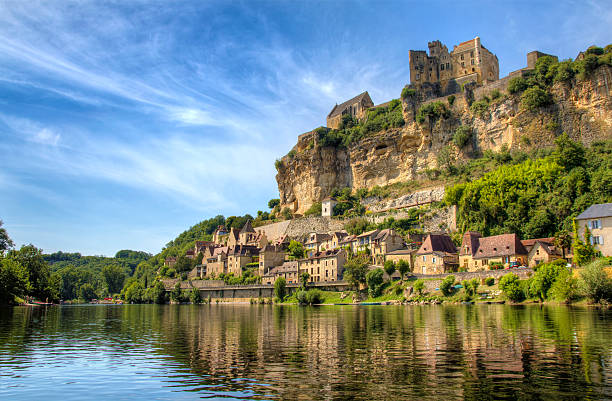 Beynac Approaching Beynac on the river Dordogne fairy tale village stock pictures, royalty-free photos & images
