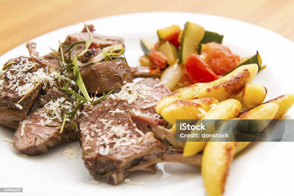 lamb racks with schupfnudeln Agricultural Field Stock Photo