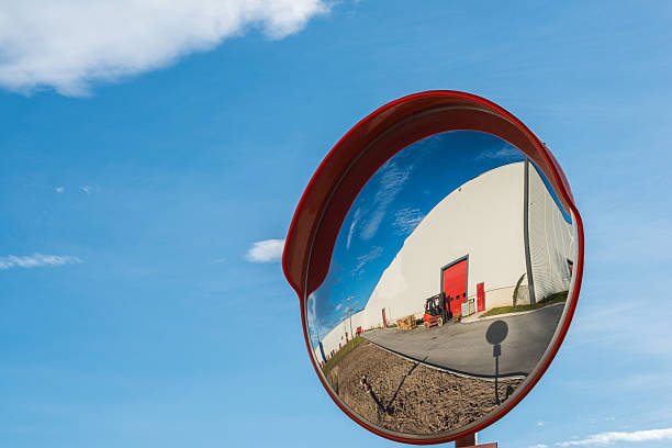 Convex mirror Convex mirrorshowing the streets in front of a factory convex stock pictures, royalty-free photos & images
