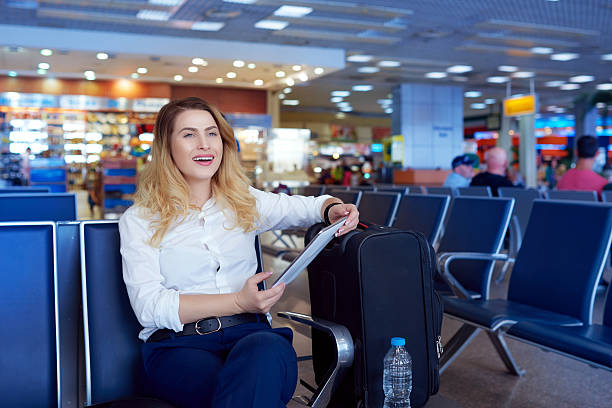 istock waiting my airplane and relaxing with my digital tablet 510157288
