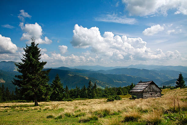 istock Mountain landscape, wooden house on a slope 510157385