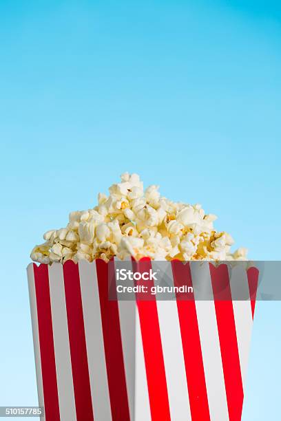 Popcorn Stock Photo - Download Image Now - Bright, Brightly Lit, Colored Background