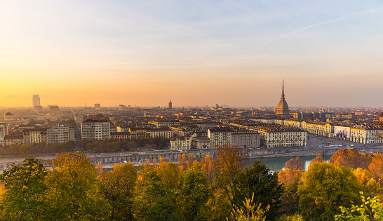 Panoramic cityscape of Turin from above at sunset