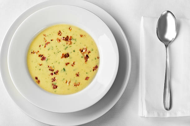 Delicious soup on the white plate elegant wedding meal