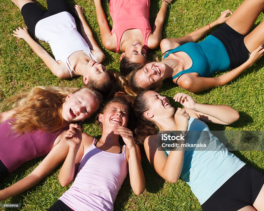Circle of teenage girls Circle of closed eyes teenage girls Teenage Girls Stock Photo
