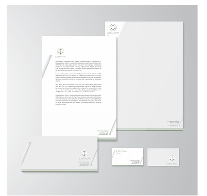 Stationery design for an advocate. Letterhead, folder, envelope and business card with logo. All design elements are layered and grouped. Eps10, contains transparent objects.