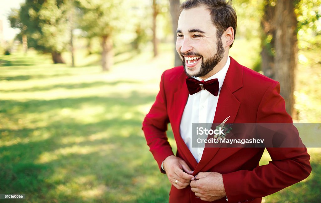 Stylish Groom In Tuxedo Laughs Suit Marsala Red Burgundy Bow Stock Photo - Download Image Now - iStock Stylish Groom In Tuxedo Laughs Suit Marsala Red Burgundy Bow Stock Photo - Download Image Now - Istock