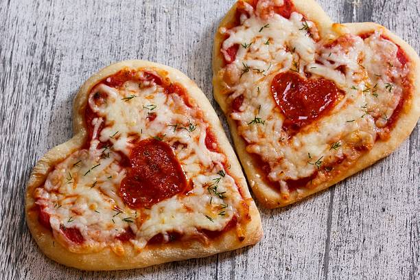 istock Heart shaped Pizza for Valentines day 510162946