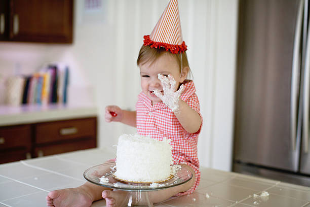 istock Baby Smashing a First Birthday Cake 510163294