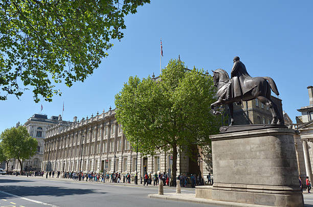London, United Kingdom - May 13, 2015: Whitehall road London England, UK. Whitehall is home for some of Britain government buildings such as Ministry of Defence, Cabinet Office building and the Horse Guards.