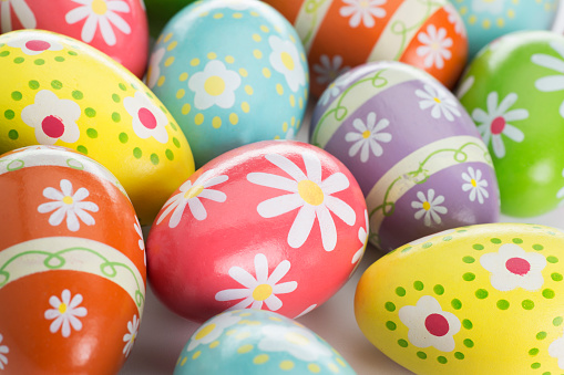 Alot of Colorful Painted Easter Eggs on White