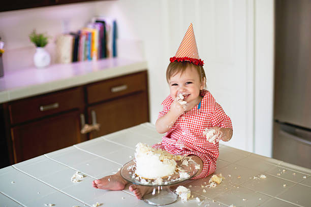 istock Happy Baby is Smahing a Cake in Kitchen 510165000
