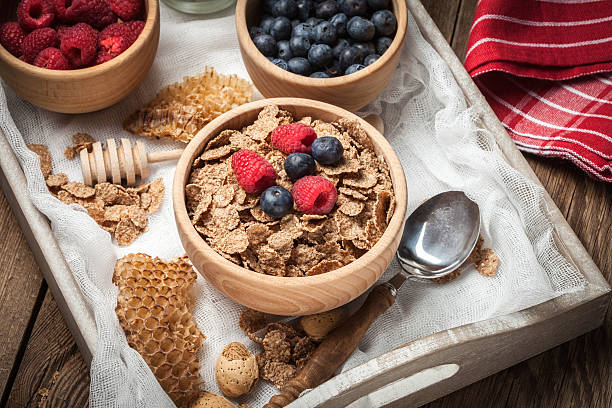 istock Bowl of cereals with blueberries and raspberrie. 510166054