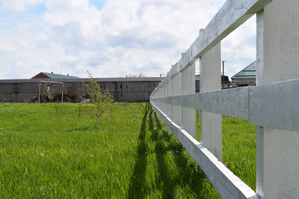 istock White wooden fence around the ranch 510166506