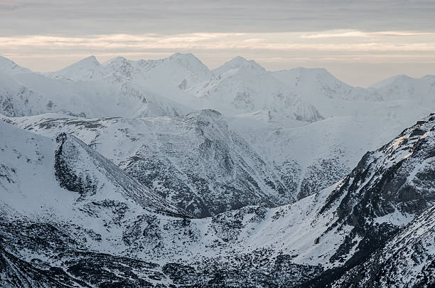 istock mountain panorama at winter in Western Tatras 510173628