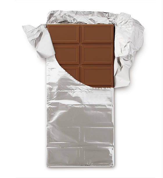 Chocolate Bar Chocolate Bar in Silver Foil isolated on white (excluding the shadow) chocolate bar photos stock pictures, royalty-free photos & images