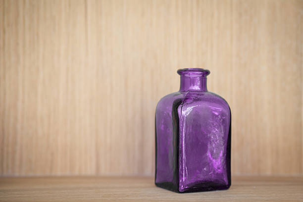 istock Purple vintage bottle 510177880