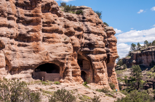 Pueblo native Americans associated with the Mogollon culture of the Southwest USA selected natural caves to build dwellings in what is now the Gila National Forest. This cliff site is included in Gila Cliff Dwellings National Monument in the Gila National Forest of southwestern New Mexico.