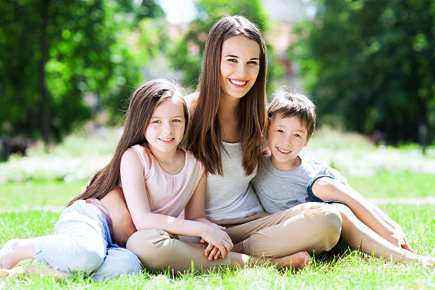 istock Mother with her children 510182435