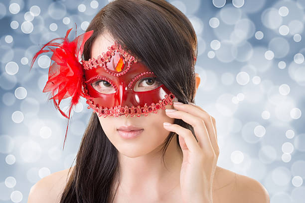 istock woman in a carnival mask 510198803