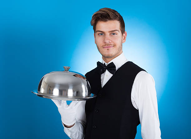 istock Confident Butler Carrying Tray 510199853