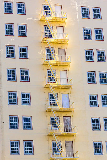 istock facade of  Hotel with fire escape ladder 510199989