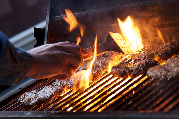 istock Barbecuing hamburgers 510200189
