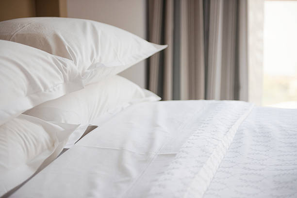 Beddings Beddings, selective focus hotel bed sheets stock pictures, royalty-free photos & images