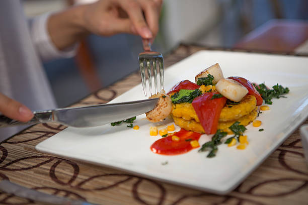 Woman eating meal, selective focus