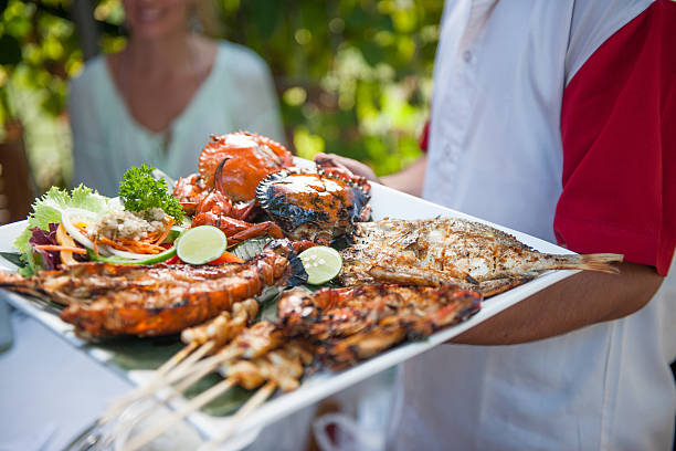 istock Waitress serving seafoods 510202697